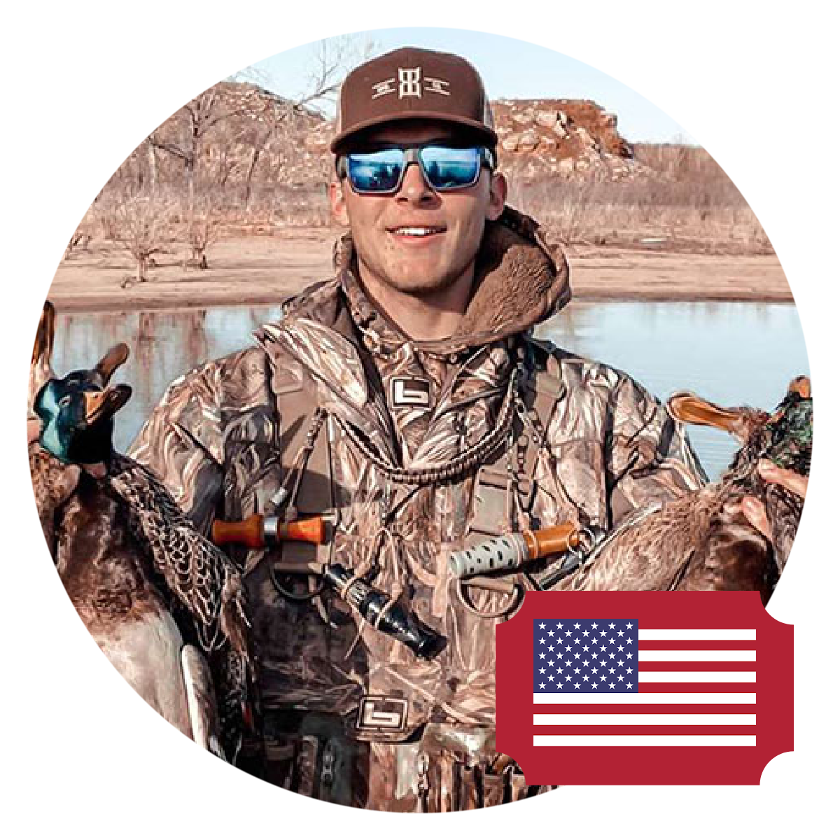 Hunter pictured at sunrise over decoys during a Maryland duck hunt.