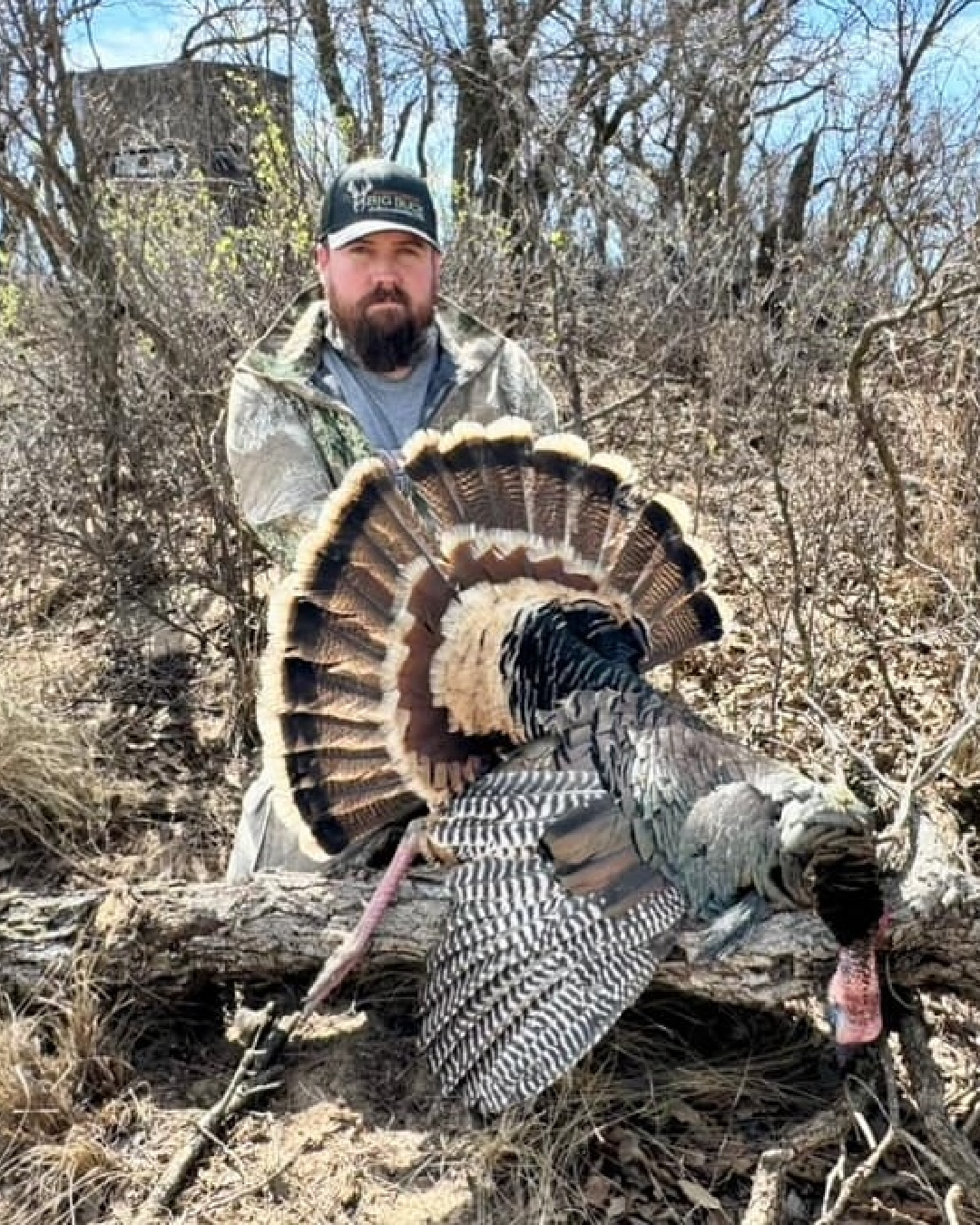 Hunter shown with turkey in Texas during a Spring Texas Turkey Hunt.