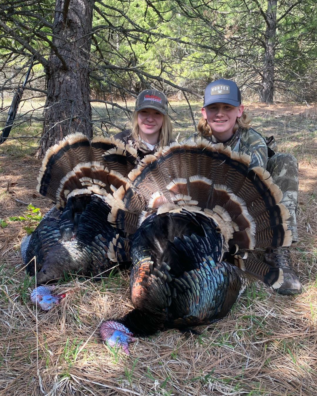 Youth hunters shown doubled-up with two gobblers during DIY hunt in Washington state during Spring Turkey season.